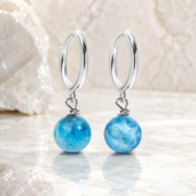 Silver Huggie Hoop Earrings with Blue Marble Bead Charms - Image 3