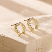 Gold Tone C‑Shaped Paved Crystal Stud Earrings - Image 2